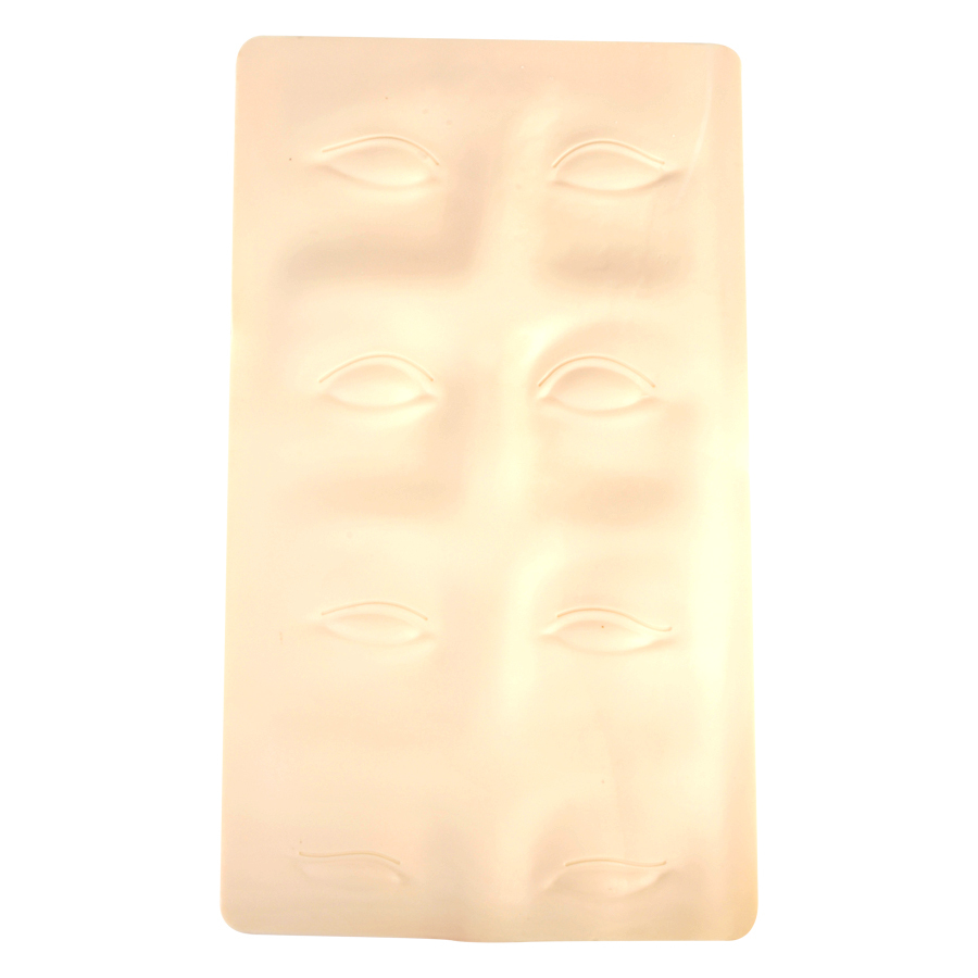 Beige Silikon Tattoo Übungshaut für Augenbrauen Beige Silikonplatte mit Augenbrauenkonturen auf weißem Hintergrund