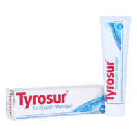 Tyrosur CareExpert Wundgel Tube neben Verpackung auf weißem Hintergrund