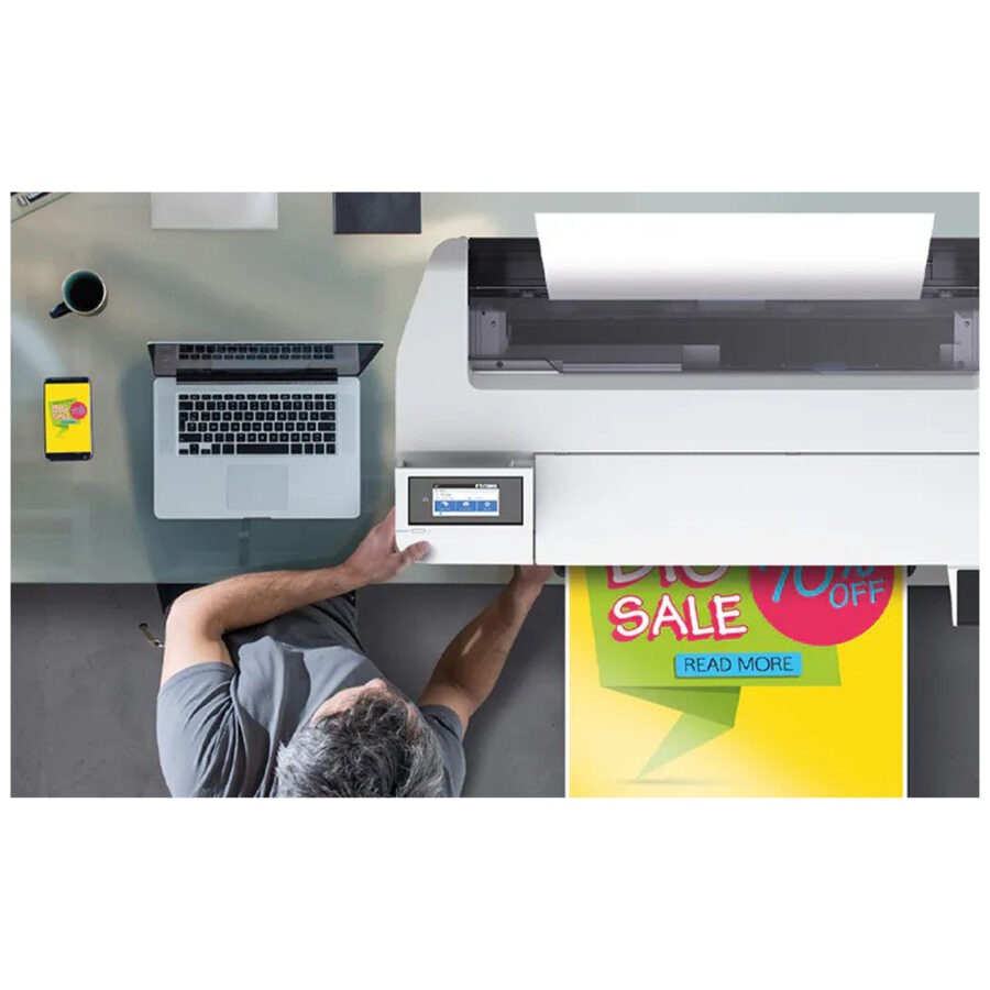 Großformatdrucker Epson SureColor SC-T3100x auf Schreibtisch mit Laptop und farbigem Druck