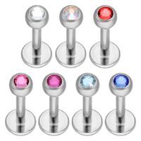 Titan Labret mit Kristallen, verschiedene Farben Silberne Titan-Labrets mit klaren, roten, rosa und blauen Kristallen auf weißem Hintergrund
